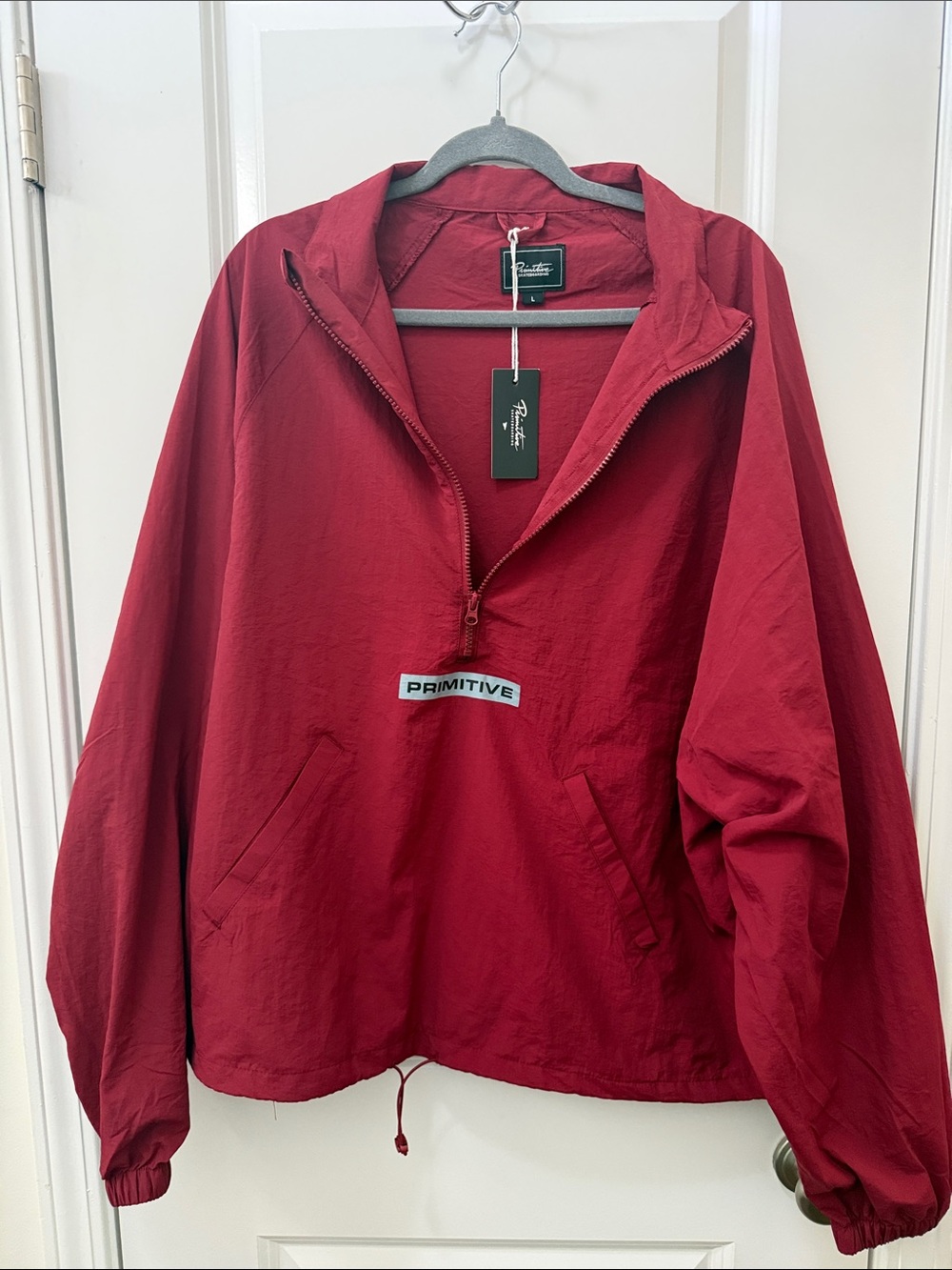 Red half-zip pullover jacket